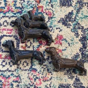 Three dachshund statues